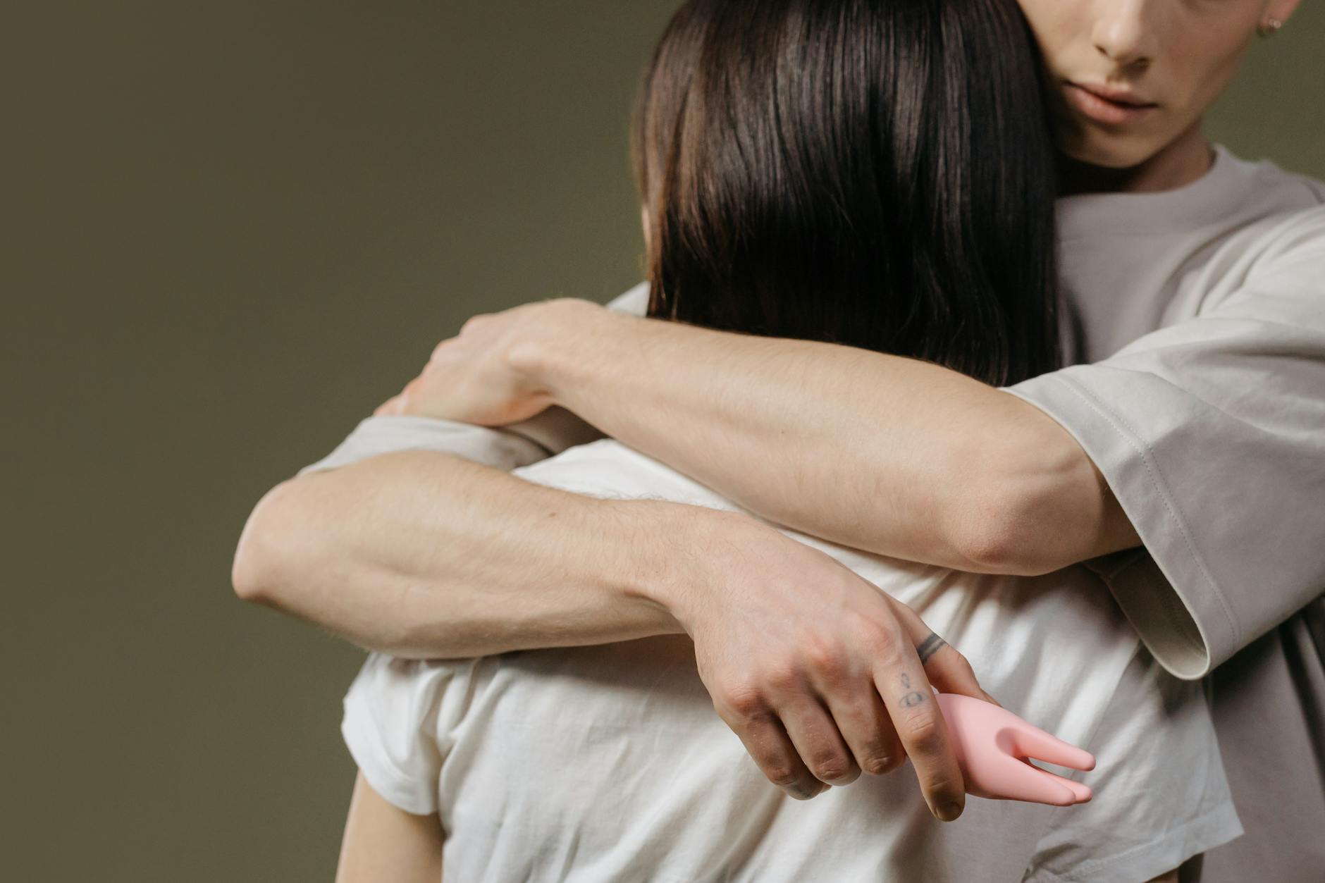Close-up of a couple embracing, highlighting emotional intimacy and physical connection after rebuilding trust